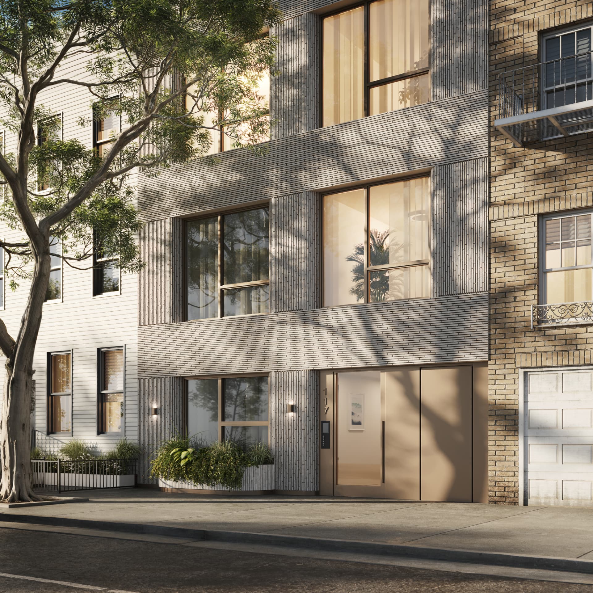 Entry and bronze-framed windows at 117 Powers Street, Williamsburg, Brooklyn