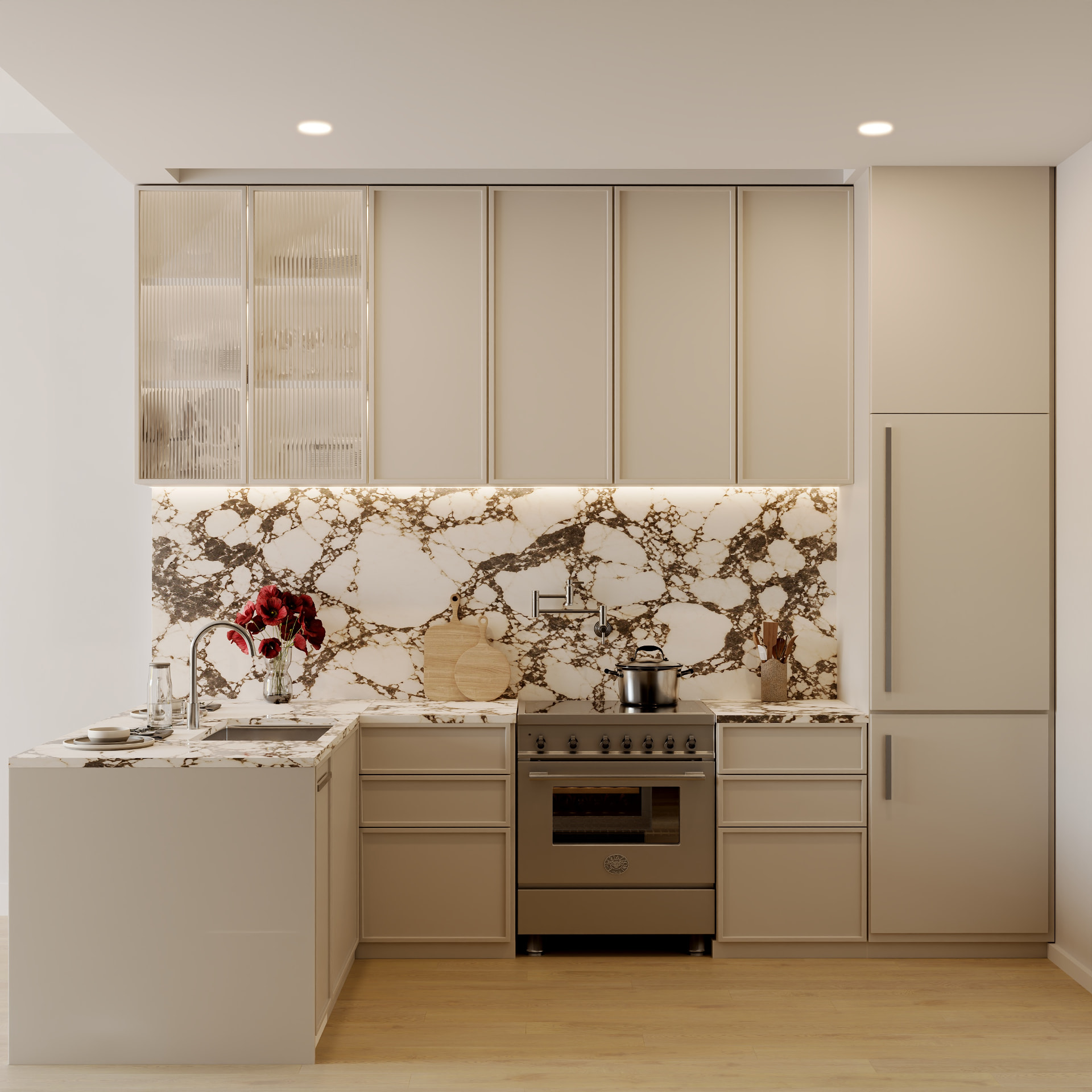 Kitchen with honed Calacatta Rubino counters and full-height backsplash at 117 Powers Street, Williamsburg